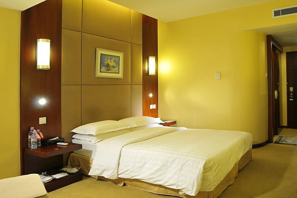 Maxcourt Hotel Changchún Habitación foto